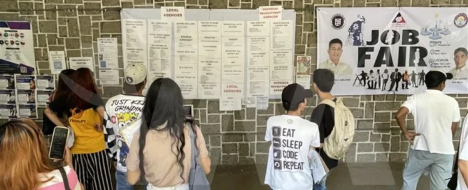 Job seekers attending a recruitment job fair hosted by an accredited Philippine recruitment agency offering overseas employment opportunities.